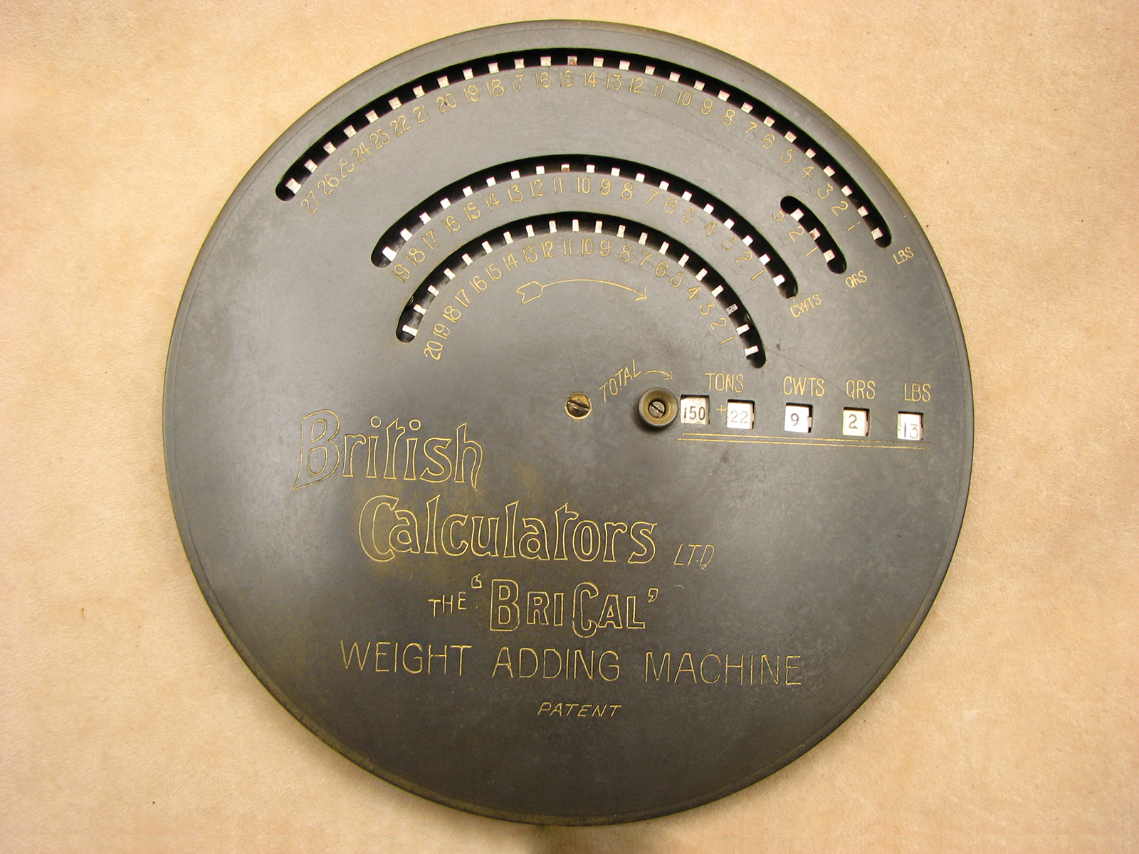 Rare BriCal Weight Adding Machine in original case. Circa 1910